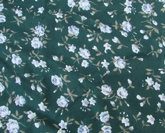 Challis rayon fabric forest green white flowers wrinkle resistant BTY flows