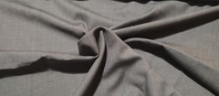 Gray Polyester Lightwieght Suiting Fabric. 13 yards x 54″ 7 pounds