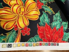 Gold Ribbons Red Poinsettias Green Holly on Black Christmas Cotton Fabric 58″W