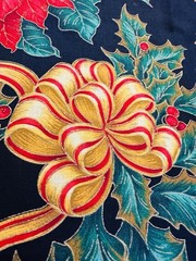 Gold Ribbons Red Poinsettias Green Holly on Black Christmas Cotton Fabric 58″W