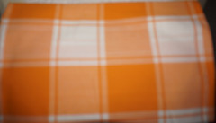 1yd x 42″, Unbranded, 4″ x 4.25″ Squares, Shades of Orange, Cotton Sewing Fabric