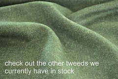 Tweed material by the metre in light brown/beige with windowpane in blue fabric
