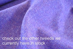 Tweed material by the metre in light brown/beige with windowpane in blue fabric