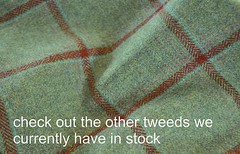 Tweed material by the metre in light brown/beige with windowpane in blue fabric