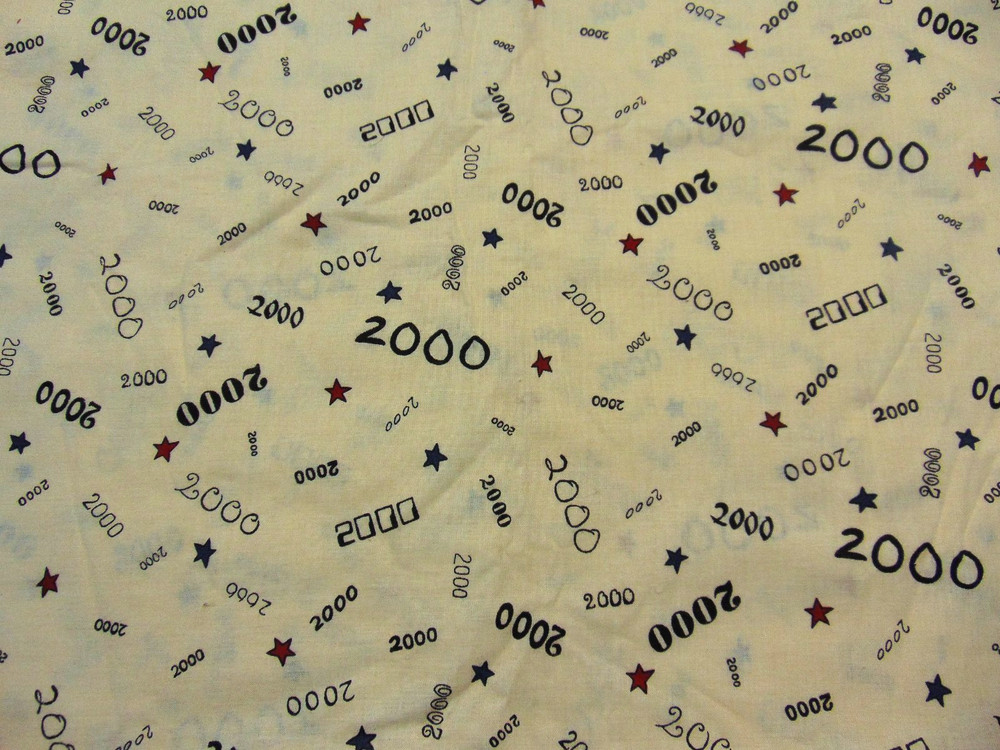 General Fabrics Year 2000 All Over Print Ecru-Red/Blue Stars 1yd x 46″