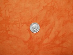 RJR FABRICS WITH AN ORANGE MARBLE BTY