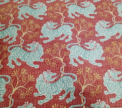 Lion Dance in Rouge BTY 54″ Wide P Kaufmann 100% Cotton Duck Medium Weight