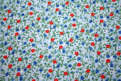 TINY RED, WHITE AND BLUE FLOWERS ON LIGHT BLUE- 100% COTTON FABRIC