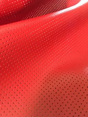 Perforated Vinyl Faux Leather upholstery Red commercial grade upholstery FOLDED