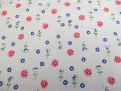 Stretch knit synthetic apparel fabric Red B;ue floral On Light Blue 1yd 22″ x 58