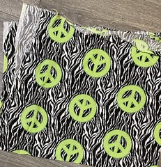 Zebra Print Fabric with Green Peace Signs