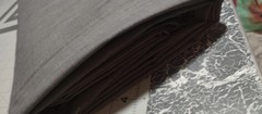 Gray Polyester Lightwieght Suiting Fabric. 13 yards x 54″ 7 pounds