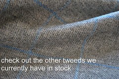 Tweed material by the metre in light brown/beige with windowpane in blue fabric