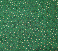 Star Print BTY The Kesslers Concord Non Metallic Gold & Black on Green
