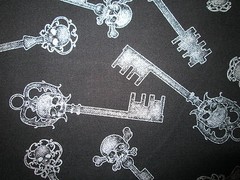 ANTIQUE KEYS WITH SKULLS METALLIC SILVER BLACK COTTON FABRIC FQ