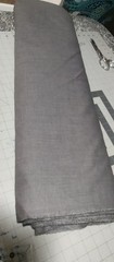 Gray Polyester Lightwieght Suiting Fabric. 13 yards x 54″ 7 pounds