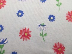 Stretch knit synthetic apparel fabric Red B;ue floral On Light Blue 1yd 22″ x 58