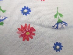 Stretch knit synthetic apparel fabric Red B;ue floral On Light Blue 1yd 22″ x 58