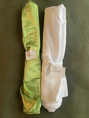 Two Fabric Pieces. Green 34” X 44”. White 59” X 43”. Unknown Material.