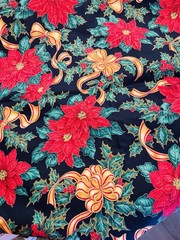 Gold Ribbons Red Poinsettias Green Holly on Black Christmas Cotton Fabric 58″W